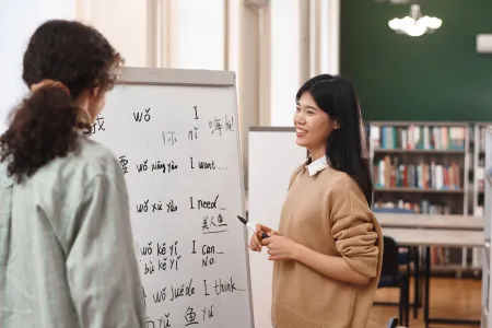 Chinese language teacher with student